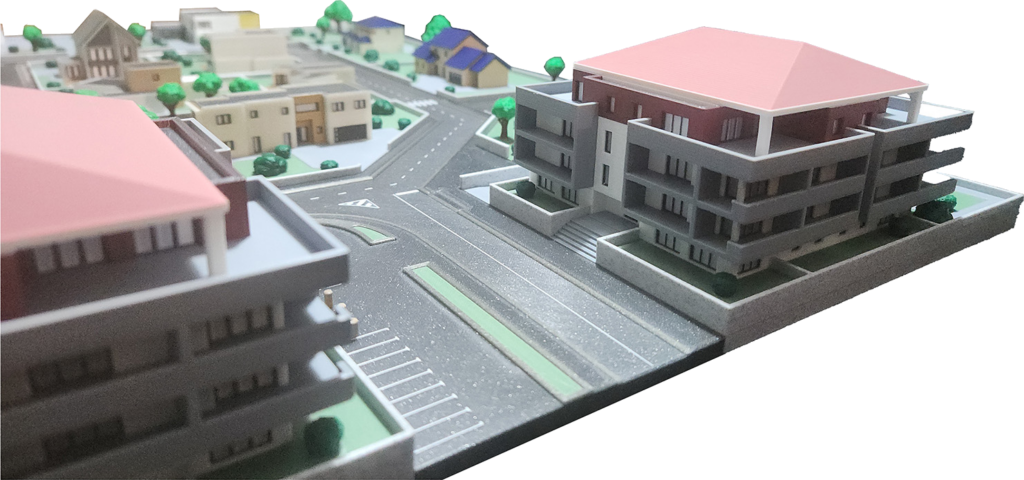 Maquette d'urbanisme 1:250, vue rapprochée des immeubles collectifs et du carrefour